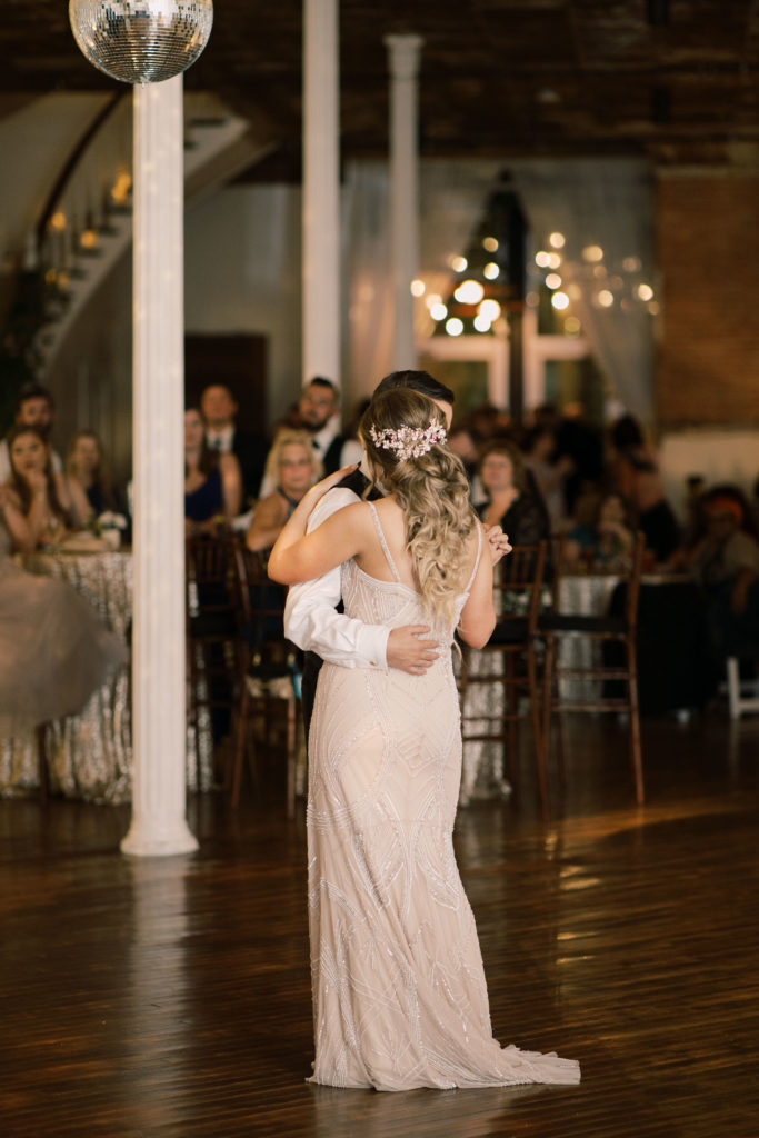 Bride and groom dancing at wedding reception